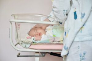 How to Help a Newborn Sleep in a Bassinet